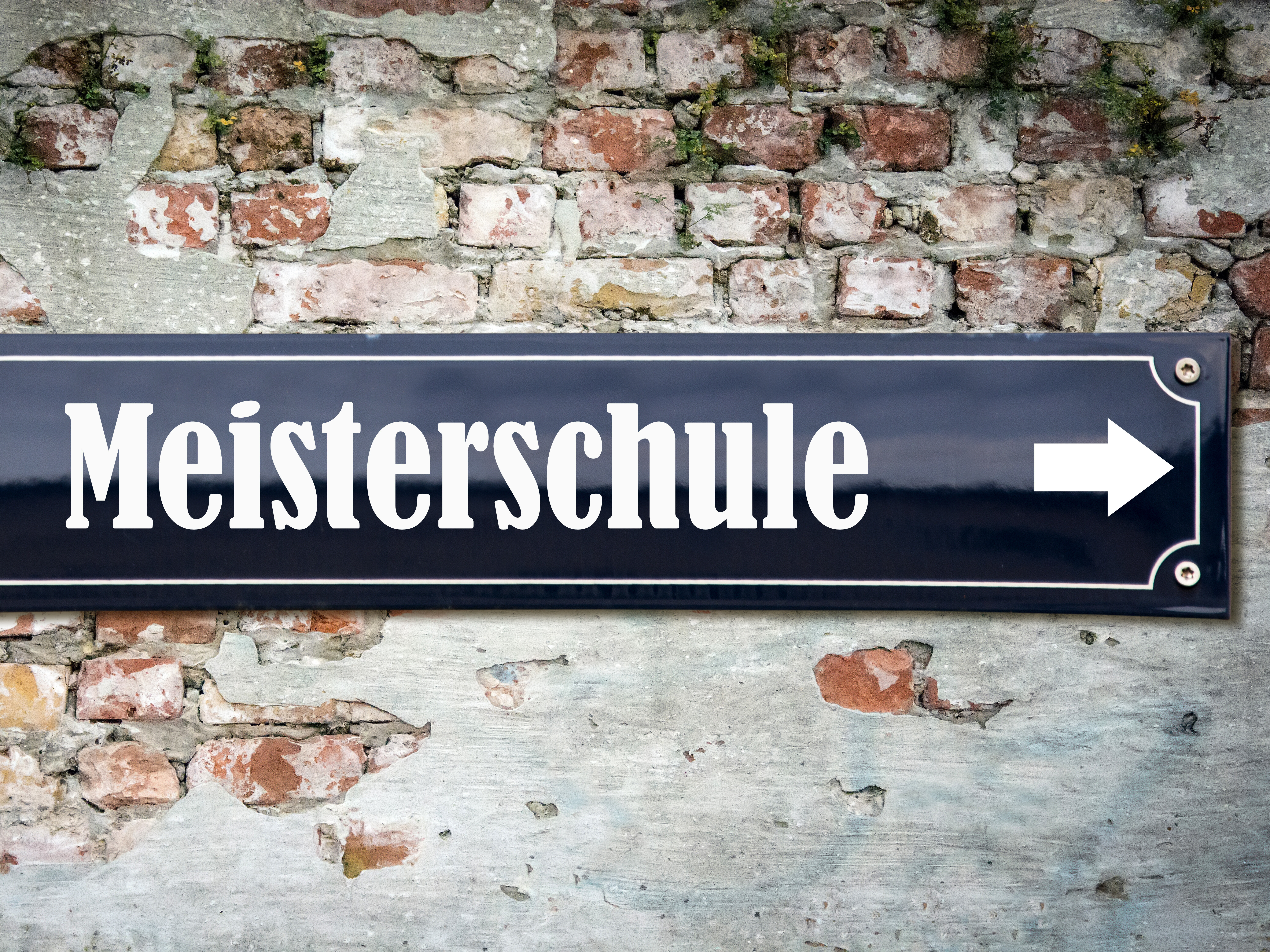 Infoabend Weiterbildung zum/zur Meister/in Eine Wand mit einem Straßenschild auf dem steht: Meisterschule